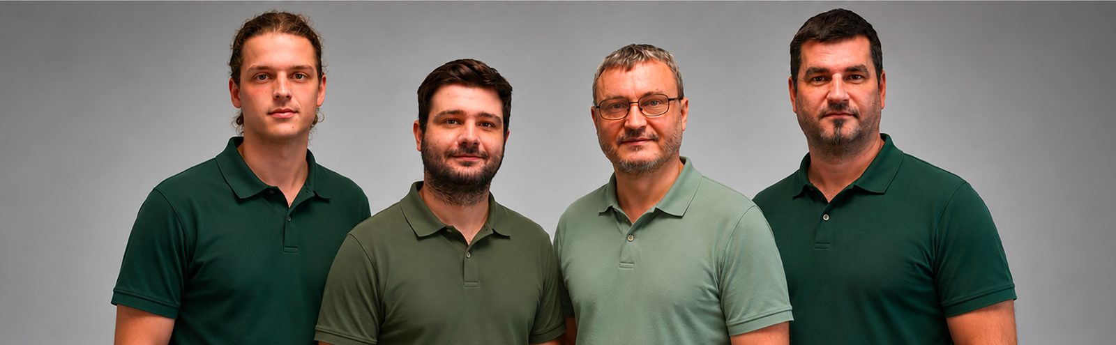 Tým prodejny K-SOFT COMPUTER – čtyři technici v zelených polokošilích